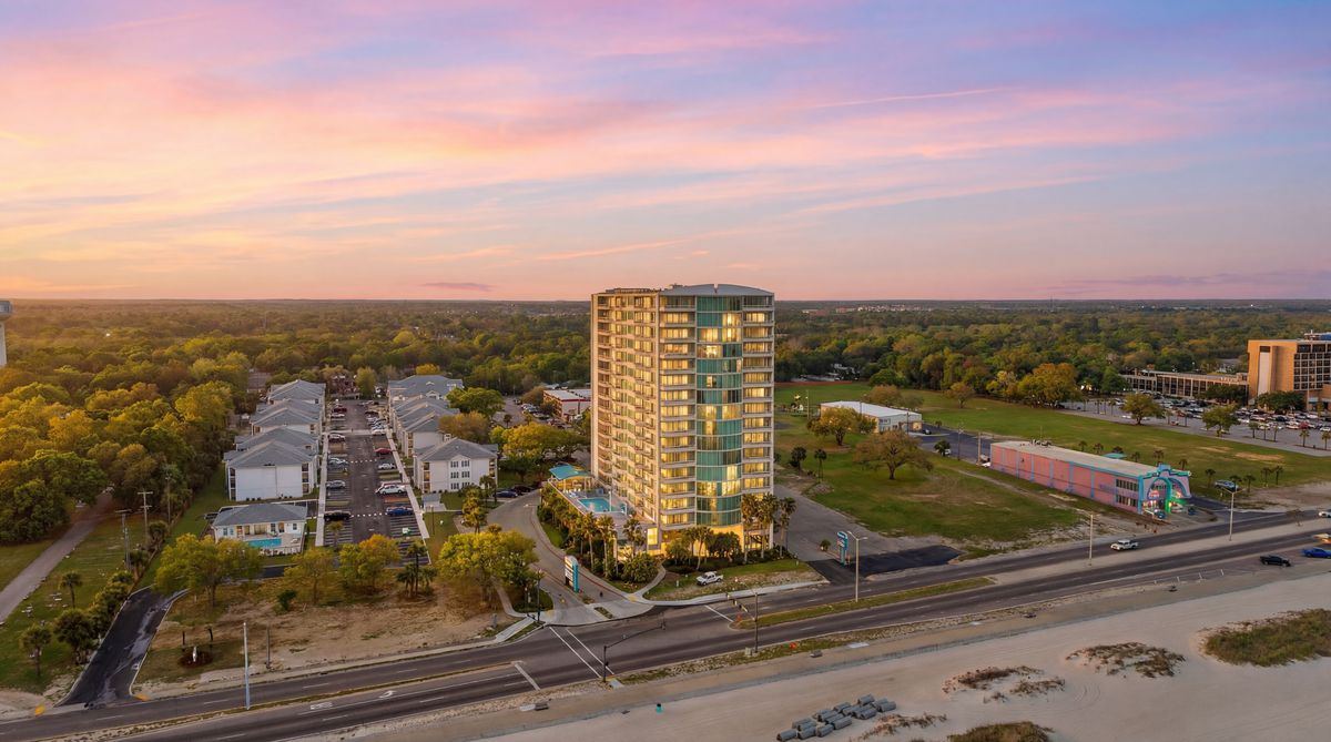 Condo tower · Sunset aerial